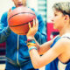 a young boy about to shoot a basketball